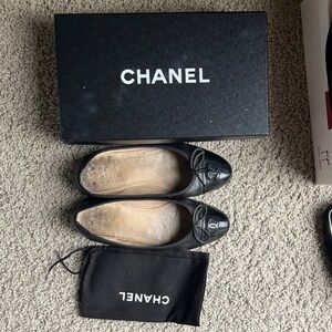CHANEL Black Leather Flats with Bow Detail